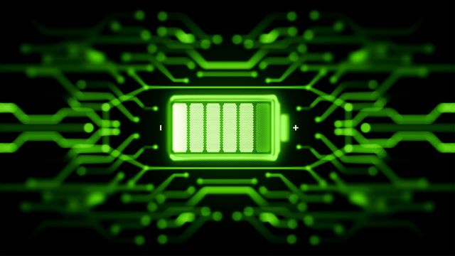Green battery icon surrounded by circuitry. 